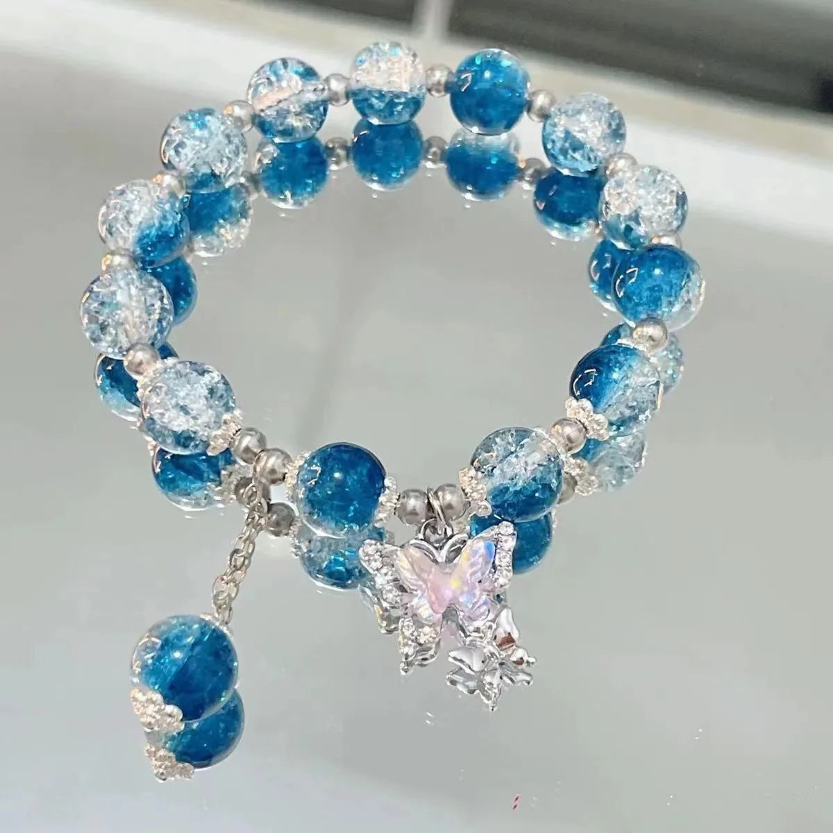 Sweet Kiss Butterfly Bracelet - Fantasy Blue Crystal & Zircon Bead Chain.